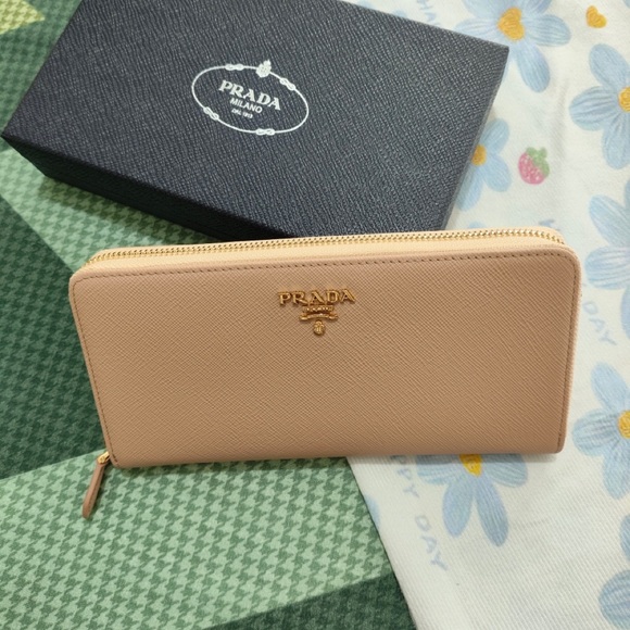 Prada Handbags - Prada Blush Pink Saffiano Zip Wallet with Gold Logo